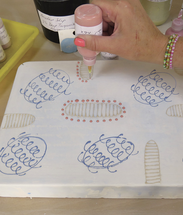 5 Add dots next, which are a regular feature in my work, along with circles, lines, and crosses.