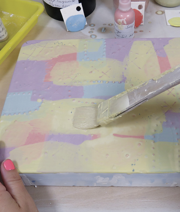 9 Lastly, add a bright color for a pop. The plaster surface is now ready for the casting slip.