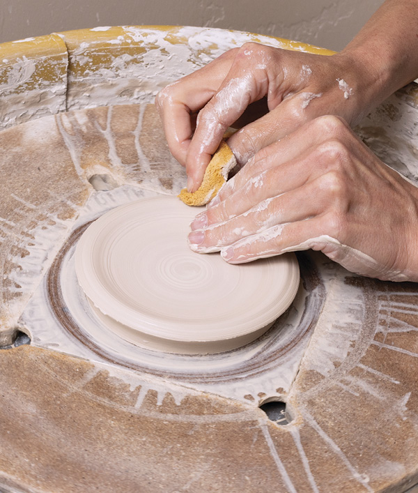 1 Throw the pin dish on the wheel, making sure there is enough thickness for the foot and magnet recess.