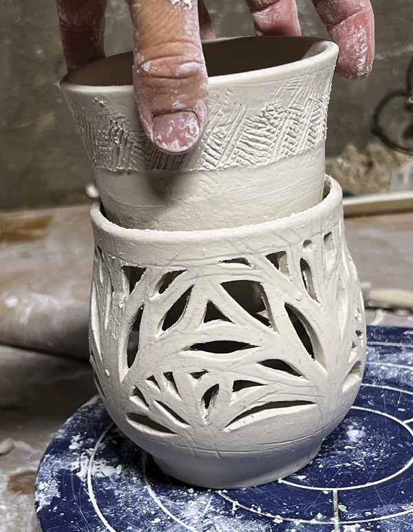 9 Score the top of the interior vessel and drop it into the carved outer vessel.