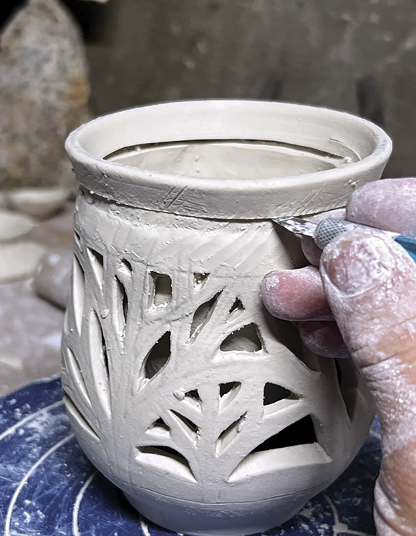 10 If the interior vessel is too tall, use a knife to cut away excess.