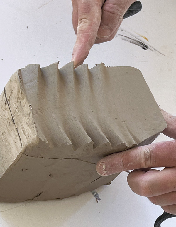 7 Wiggle your wire tool to create interesting textured surfaces.