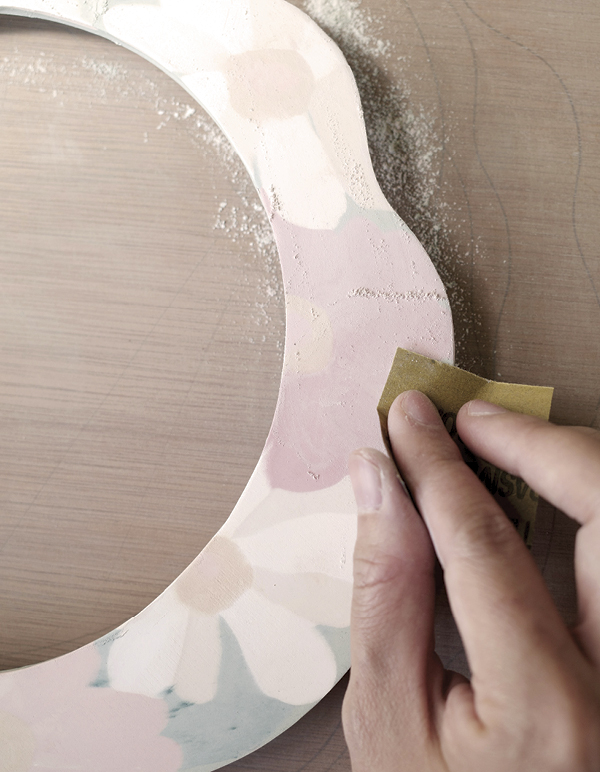 13 Dry slowly, bisque fire, then sand the front surface to sharpen the patterns.