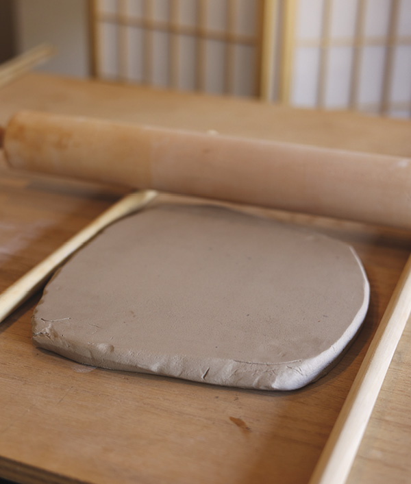 1 Roll an even slab using a slab roller or a rolling pin and thickness guide sticks.