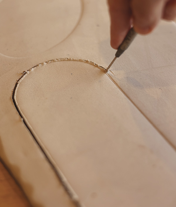 4 Cut the handles out with a needle tool or knife.