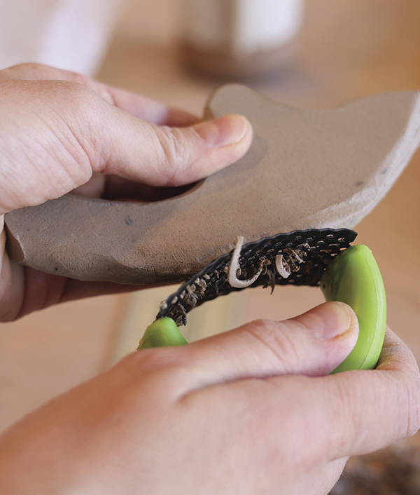 7 Use a Surform rasp to shape and clean the edges further.
