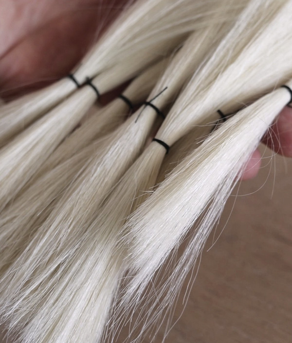 14 Repeat until all bundles are tied together the same way.