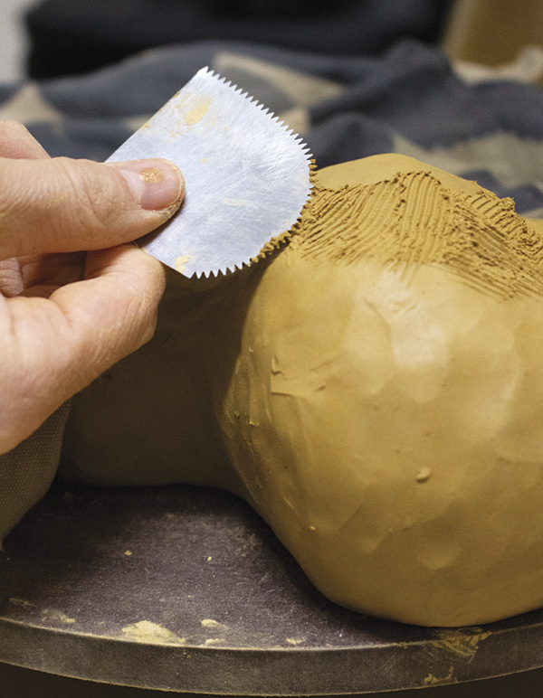11 After you close the form, work over the joints with the serrated rib.
