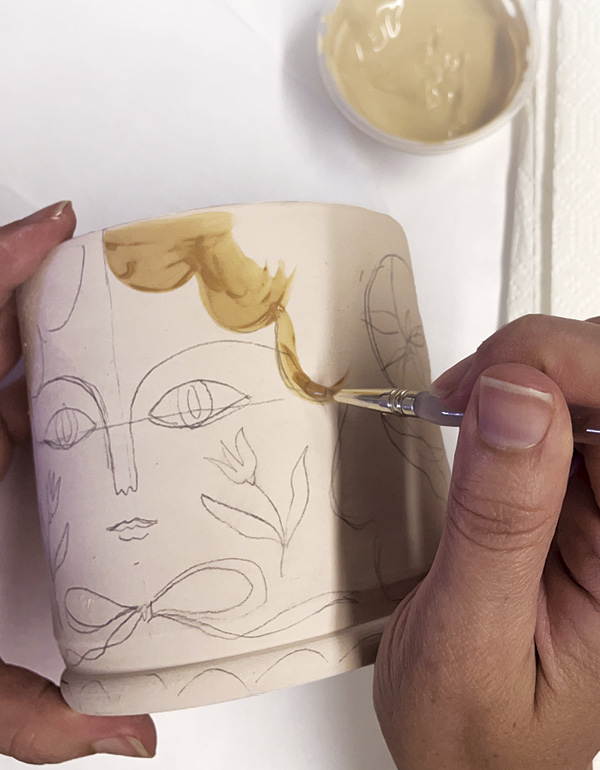 6 Brush on 1–2 coats of underglaze in various colors.