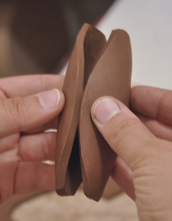 6 Press the two halves together around the curved edges.