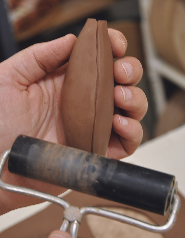 8 Use a small brayer to compress the seams while leaving the join visible.