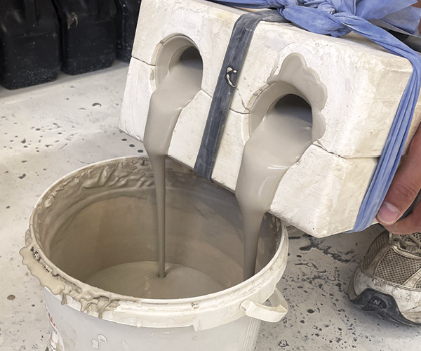 3 Once the casting slip has firmed up to form a ceramic wall, slowly pour out the rest of the slip.