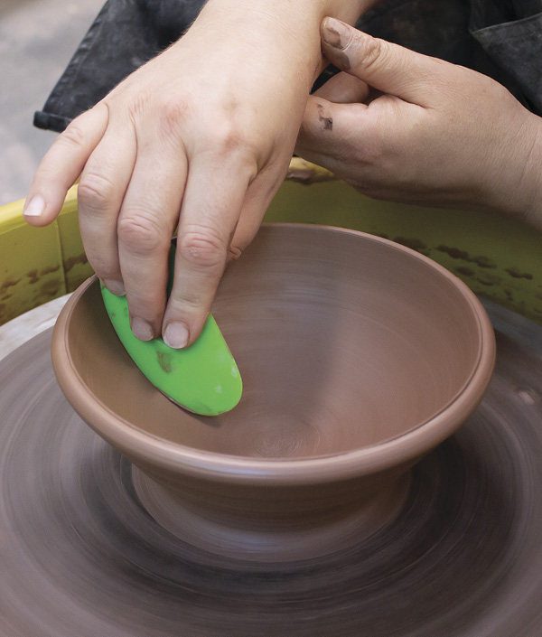 1 When forming your bowl on the wheel, use a rib on the inside to create a smooth, continuous curve.