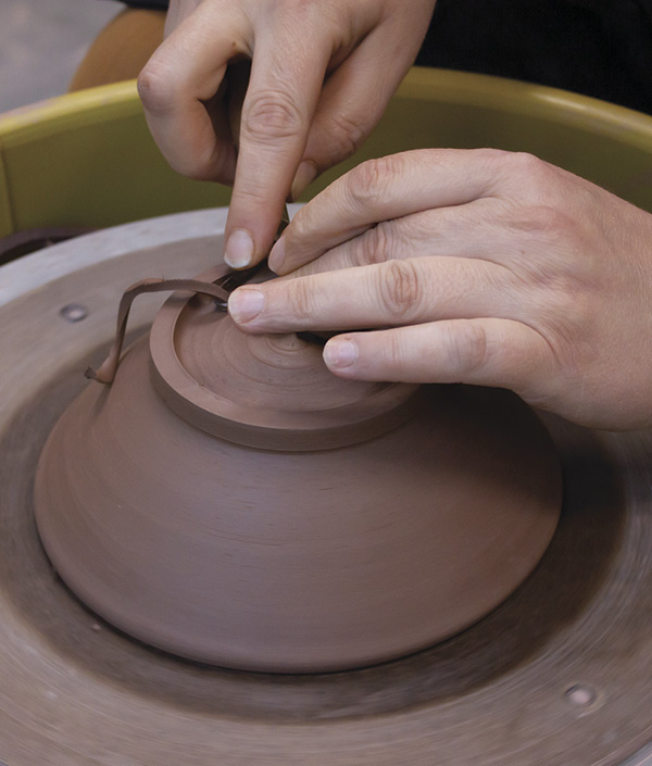 2 Clean up the outside shape of the bowl following the inside curve then trim a simple foot.