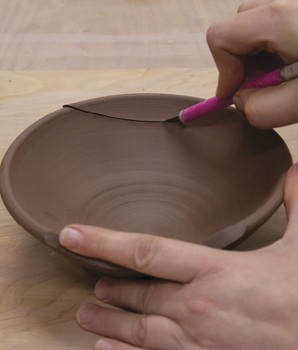 3 Slice off a segment of the rim using a sharp blade. Cut at a 45º angle with the blade pointing downward.