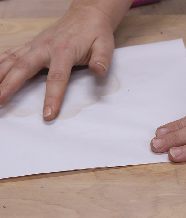 6 Soften the rim edges by placing the pieces between paper, then rub your finger over the edge on both sides.