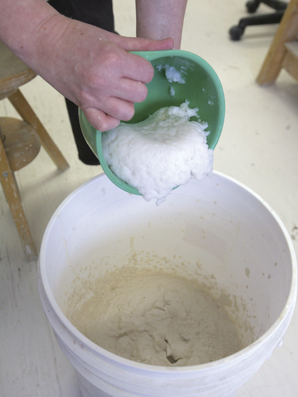 4 Add the paper pulp to blended porcelain slip.