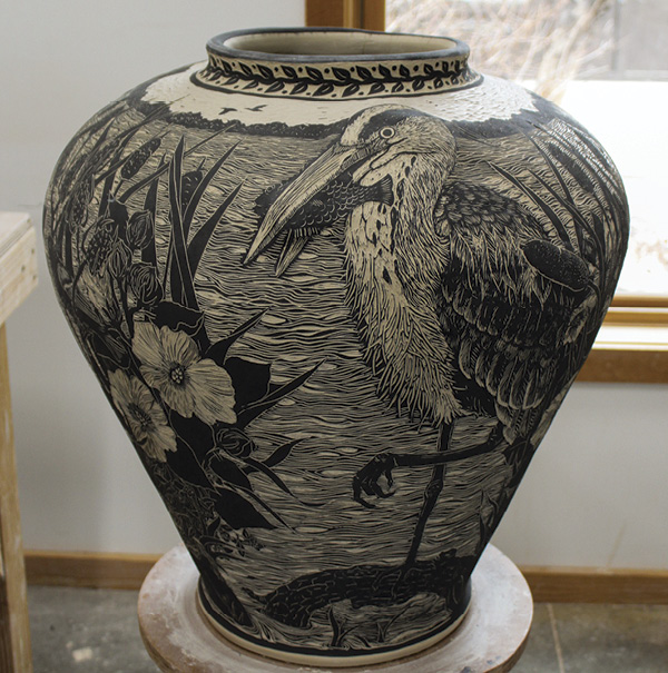 Ceramic selling vase in sgraffito technique decorated with knitting