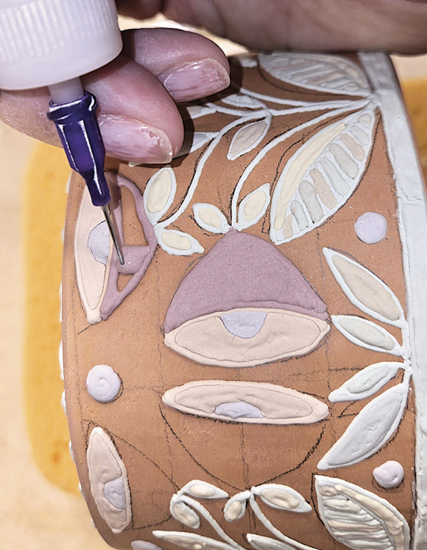 12 Fill in the outlined sections with the same glaze color.