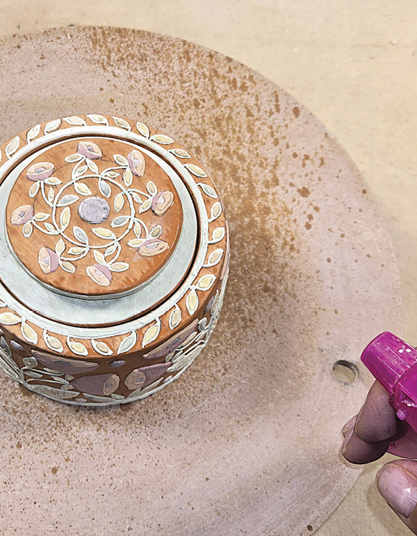 13 Spray a water/CMC gum solution to harden the glaze for more handling.