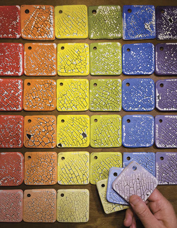 6 Tinted underglaze tiles pulled from the wall to form a color palette.