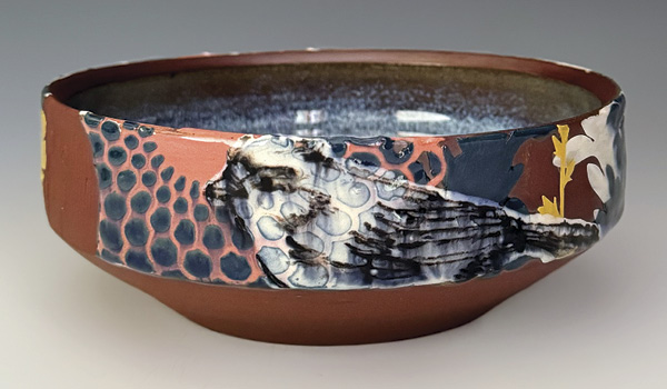 Becky Meneely's Tufted Titmouse Bowl (front), 8 in. (20.3 cm) in diameter, wheel-thrown red stoneware, slip, underglaze, glaze, fired to cone 6 in an electric kiln, 2024.