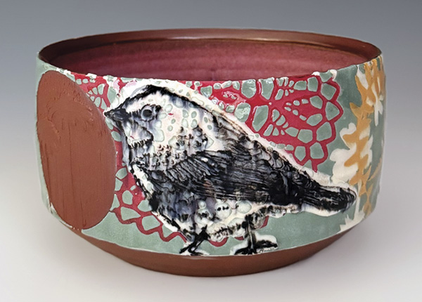 Becky Meneely's Warbler bowl (front), 5½ in. (14 cm) in diameter, wheel-thrown red stoneware, slip, underglaze, glaze, fired to cone 6 in an electric kiln.