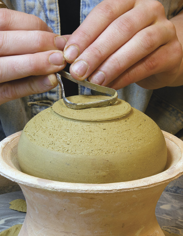 9 Place the body in a chuck and trim it to refine the shape.