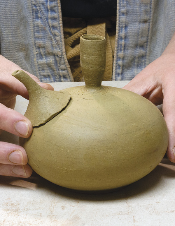 14 Visualize where the spout will be placed on the body.