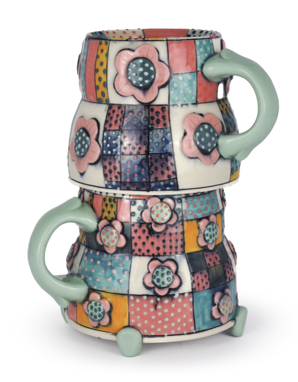 Two finished mugs, stacked, by Be Rose.