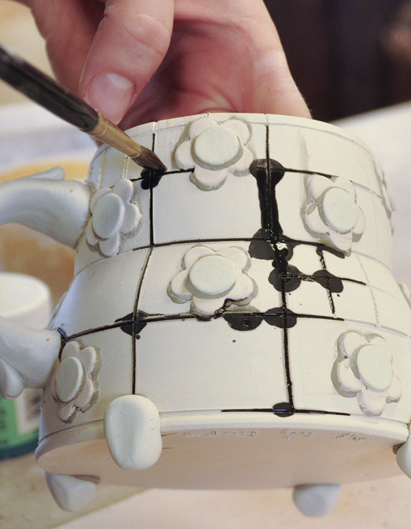 10 Inlay watered-down Mason stains to highlight the carved lines.