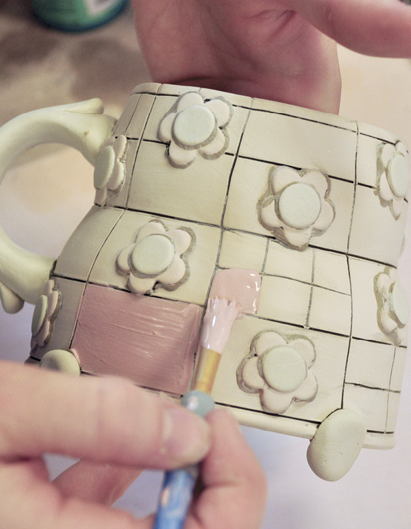 12 Paint various colors of underglaze in the grid squares.