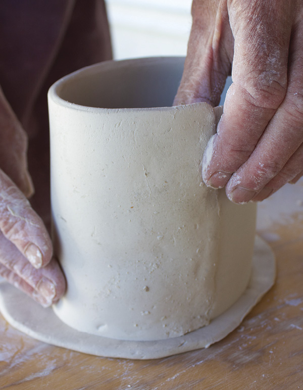 1 Shape a slab into a cylinder, keep the seam visible, and add a bottom.