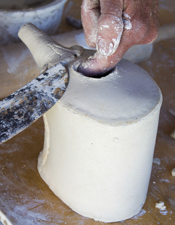 6 Cut a hole in the top, compress with a finger inside and a rib on the outside.