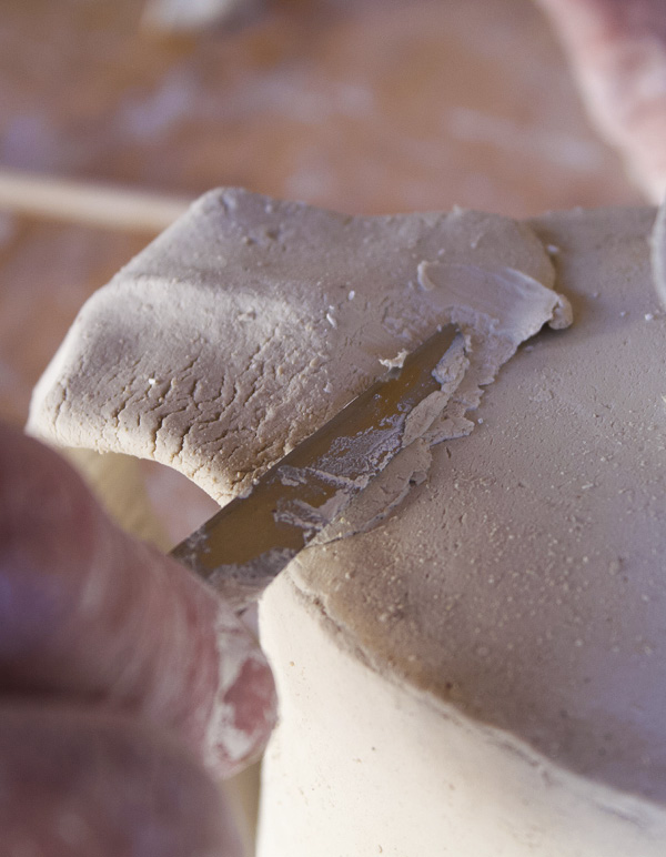 9 Attach the handle high enough on the body for good balance.