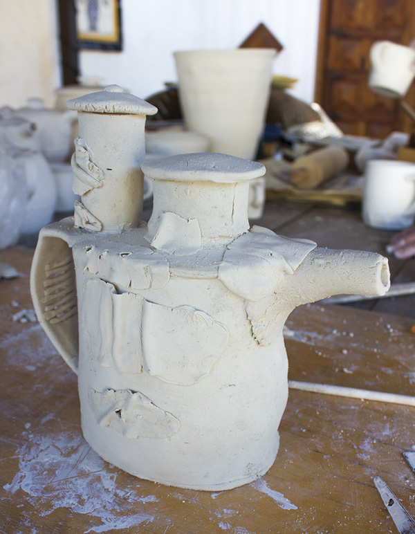 12 Add very thin, wrinkled slabs and incised lines for surface embellishment.