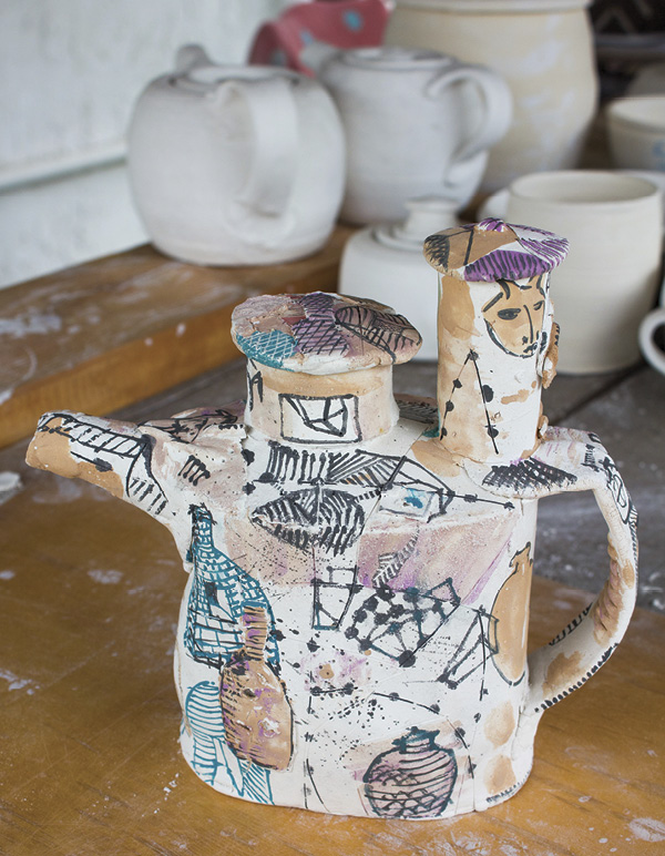 14 I use a simple, cone-6 clear glaze to cover the surface and line the interior.