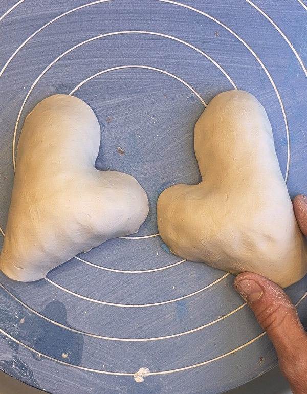 3 Repeat the pinching on the mirrored partner shape.
