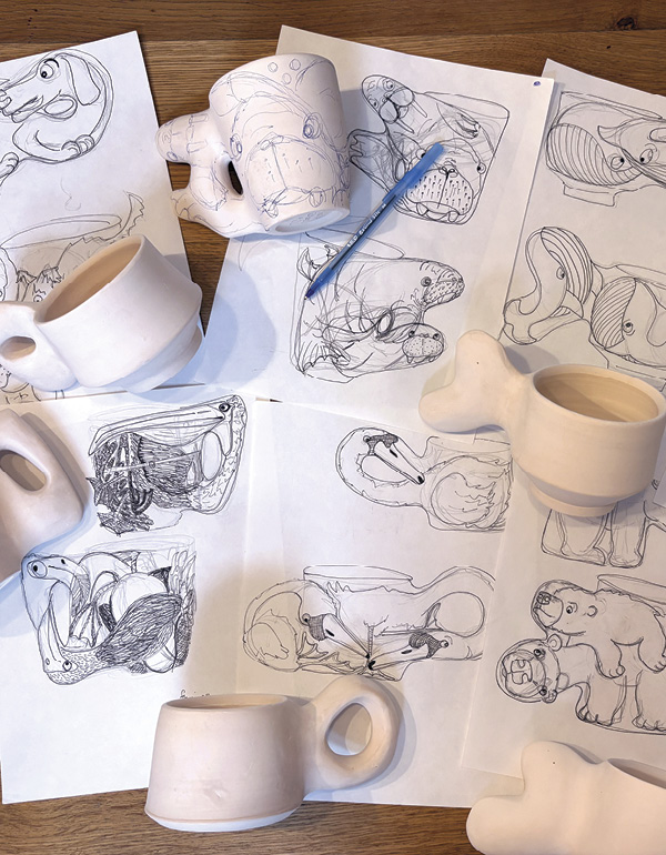 11 Bisque fire. Then, explore how to map out the drawings on each pot.