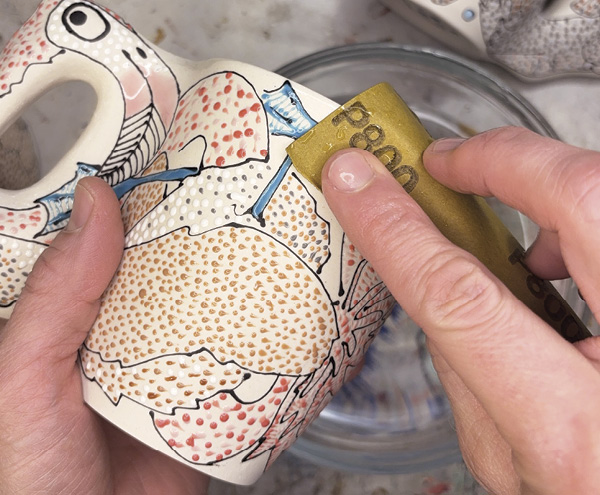 15 After the final firing, clean up any exposed porcelain with wet/dry sandpaper.