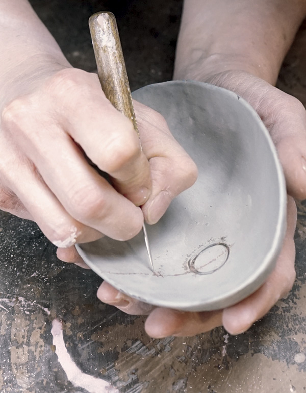 7 Use the same tools to make marks on the interior.