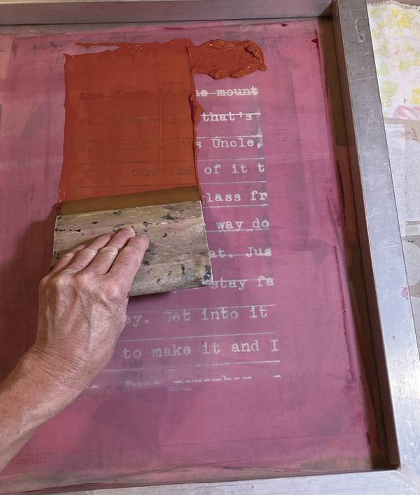 11 Place a silk screen with text directly onto the slab. Add a bead of underglaze, pull the underglaze down the screen.
