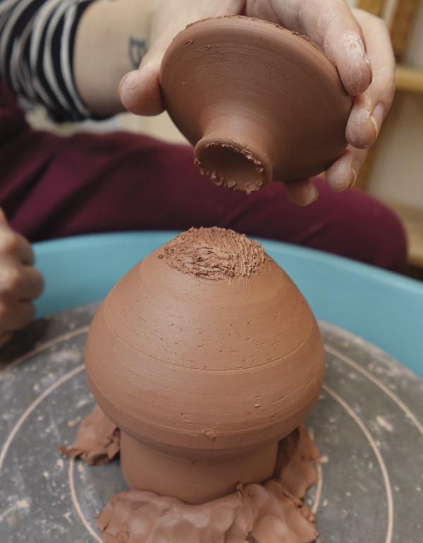 4 Score and slip to attach the pedestal to the body. Ensure it sits flat.