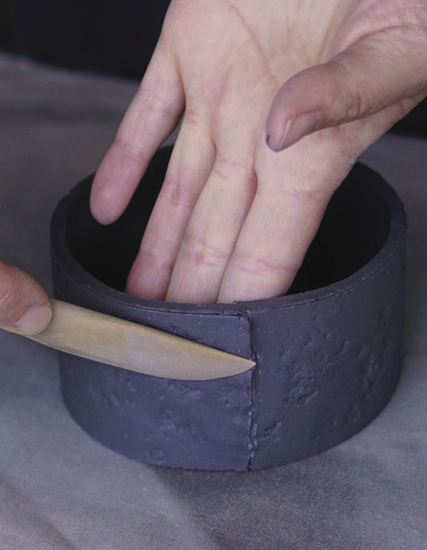 3 Score, slip, then join the slab edges. Smooth the seam, removing any air.