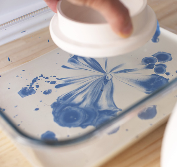 5 Gently dip or drag your bisque-fired ceramic piece through the bisque engobe mixture.