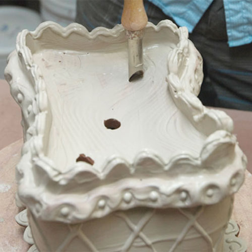 Fig.13 Cut holes for the flower in the top slab using a hole cutter.