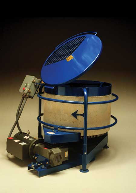 The Soldner mixer (above) is an example of a vertical shaft mixer. This clay mixer uses a concrete tub that carries clay through stationary bars that blend the clay as it moves through. (Photo courtesy Muddy Elbow Mfg.)