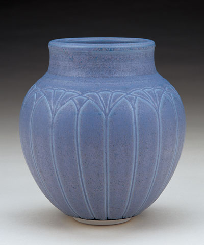 This wheel-thrown porcelain vase was carefully incised and fired to Cone 10 in reduction, by Ann Selberg.