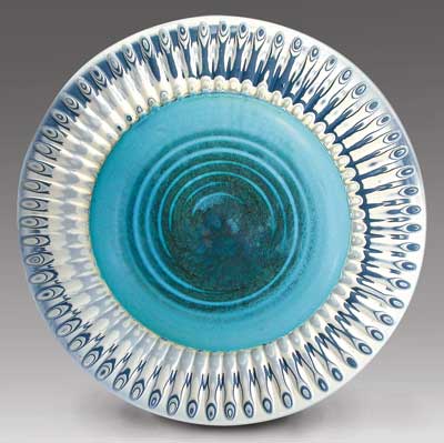 Porcelain bowl with colored clay rim, by Robin Hopper.