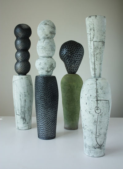 Carriers, 37 in. (94 cm) in height, stoneware, raku, and smoked clay, 2009. 